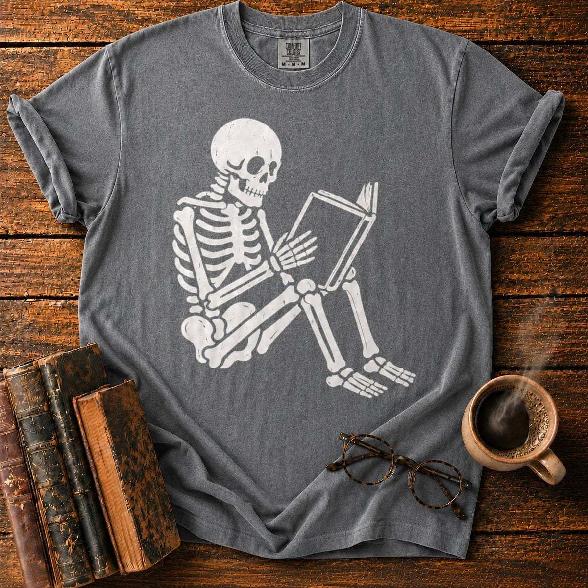 Seated Skeleton Reading An Open Book T-Shirt in Pepper – BooksThreads