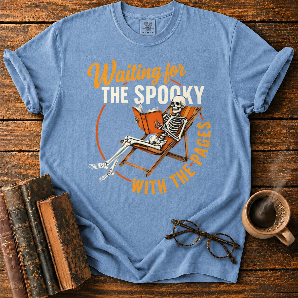 Skeleton, Book, And Chair On Black T-Shirt in Blue Jean – BooksThreads