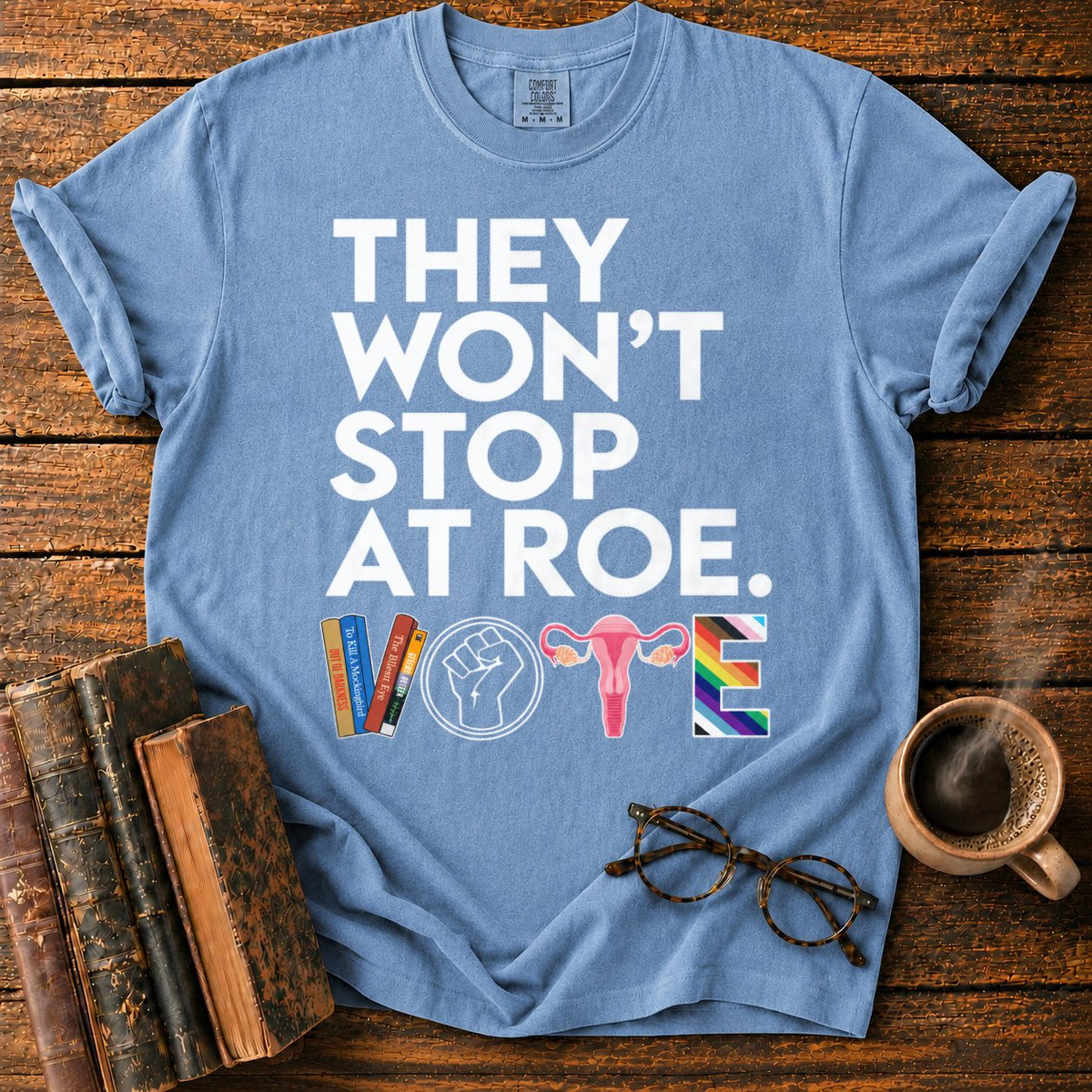 Vote With Books, Fist, Uterus, Pride T-Shirt in Blue Jean – BooksThreads