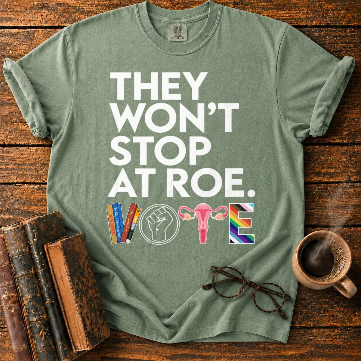 Vote With Books, Fist, Uterus, Pride T-Shirt in Moss – BooksThreads