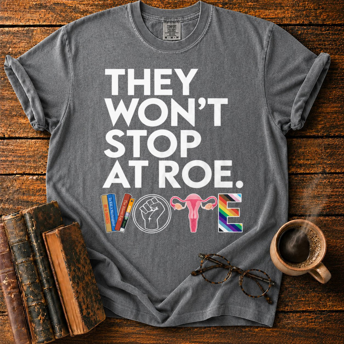 Vote With Books, Fist, Uterus, Pride T-Shirt in Pepper – BooksThreads