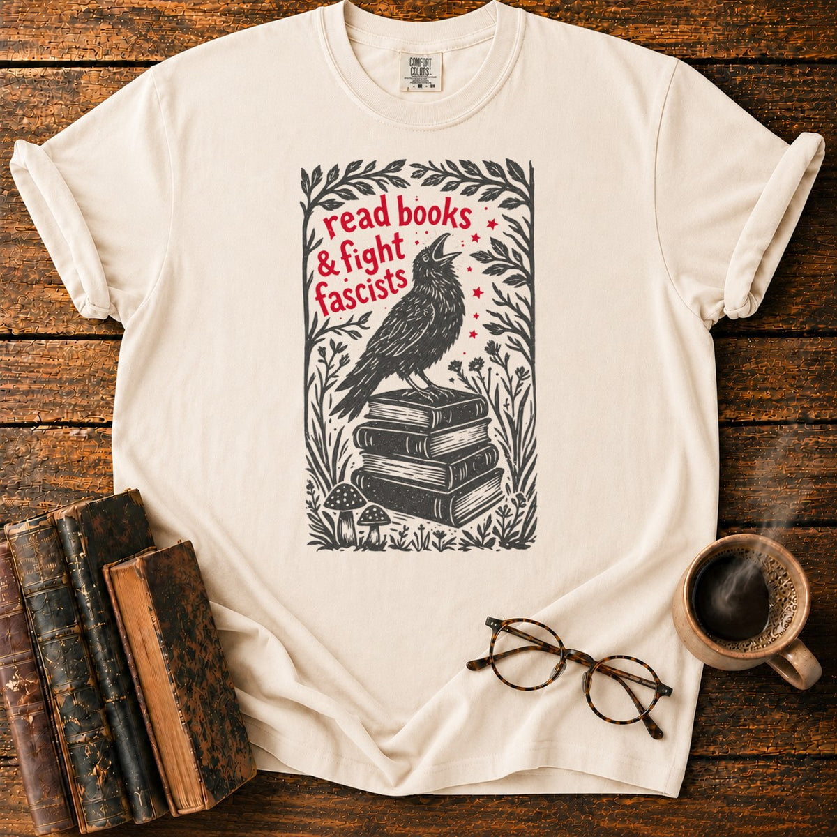 Woodcut Raven Atop Antique Books T-Shirt in Ivory – BooksThreads
